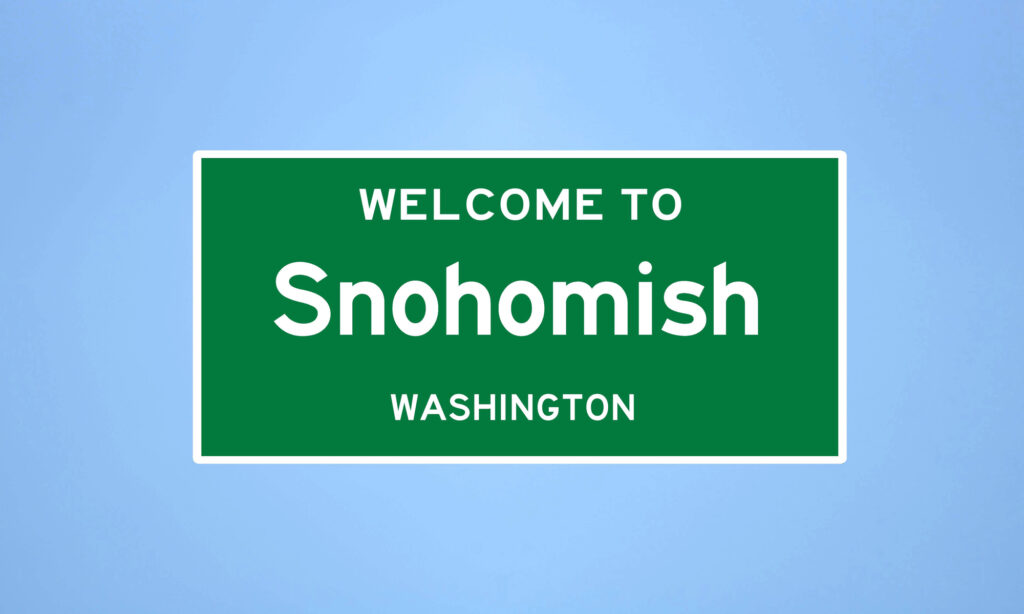 Green and white sign Welcome to Snohomish Washington